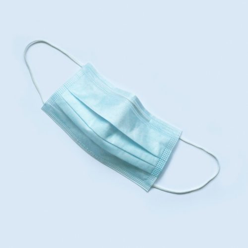 a surgical mask on a white background